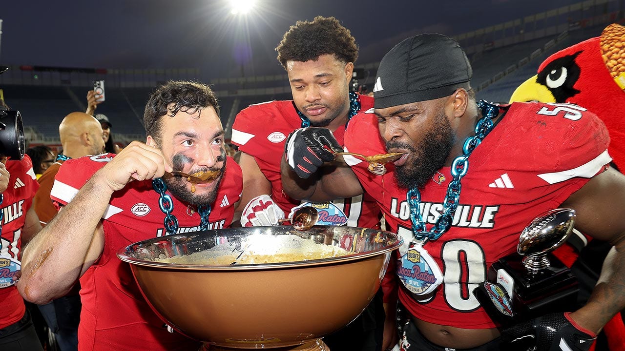 Louisville Players Eat Beans After Win.jpg