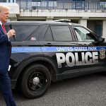 Trump And A Police Car.jpg