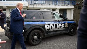 Trump And A Police Car.jpg