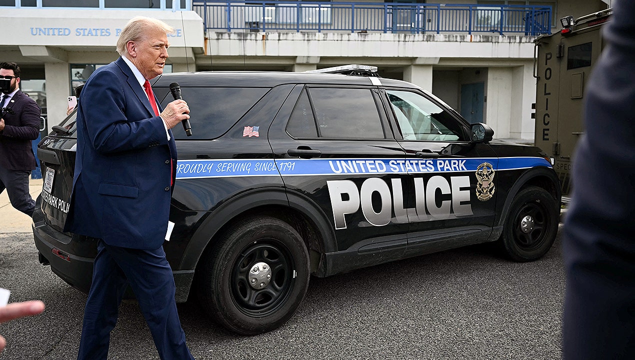 Trump And A Police Car.jpg