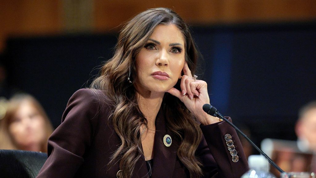 Noem Glance During Hearing.jpeg
